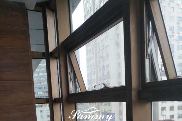 上海徐汇肇嘉浜路736号铝合金门窗仿木纹漆施工
